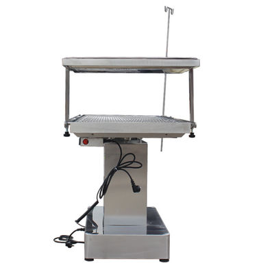 Tabla de operación veterinaria inclinable bidireccional termostática de acero inoxidable